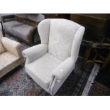 A wing armchair