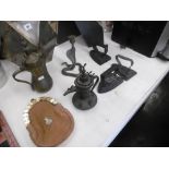 A quantity of metalware including two Middle Eastern tea pots