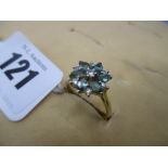 An 18ct gold & emerald diamond cluster ring size N