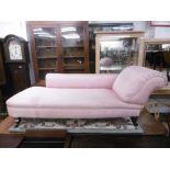 An upholstered chaise lounge