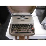 a vintage cased typewriter
