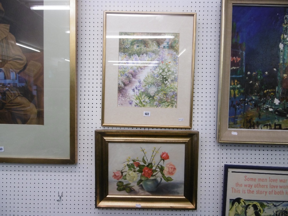 A framed still life oils on board still life of flowers in jug and watercolour of English country