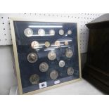 A framed set of coins