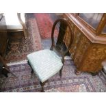 A SET OF FOUR MAHOGANY DINING CHAIRS