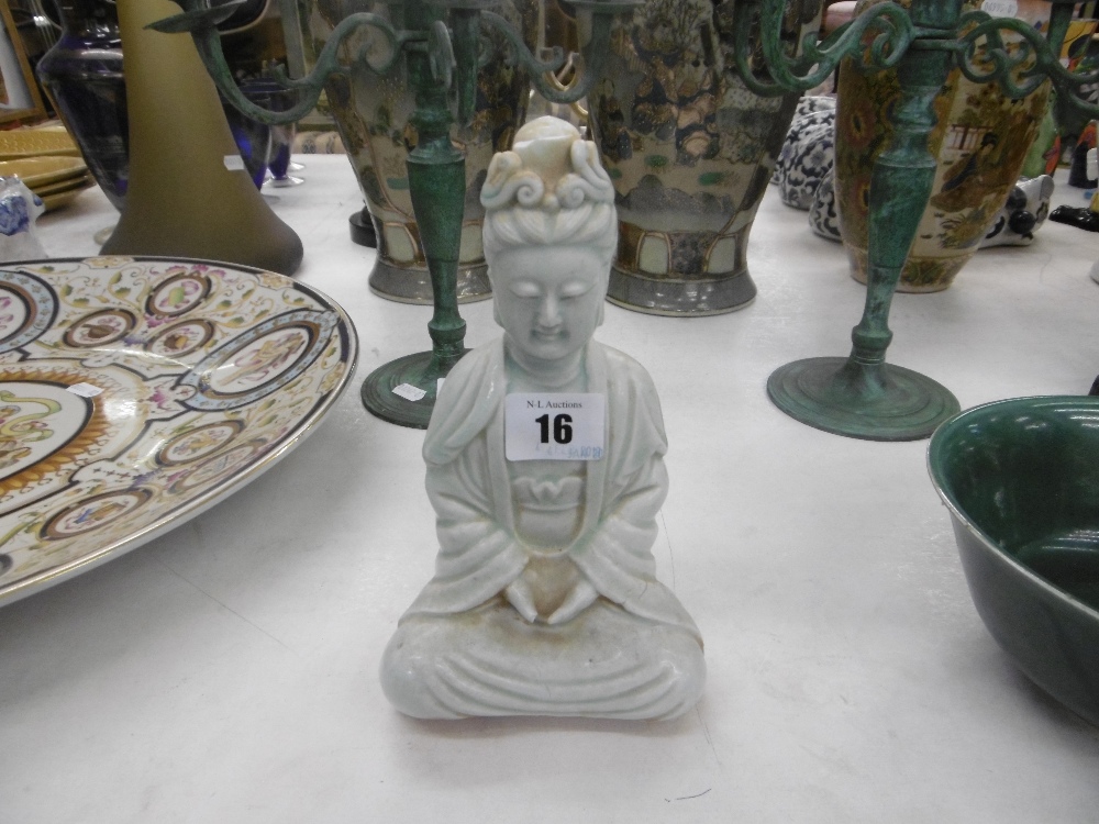 A Chinese 'Song style' porcelain figure of Quan Yin, 20cms high, a.