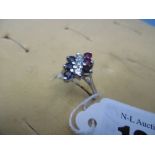 A white metal sapphire, diamond & ruby ring size N.