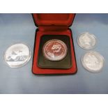 Four silver proof coins