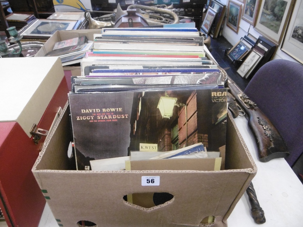 A large assortment of pop and rock & roll LP's and some 45s