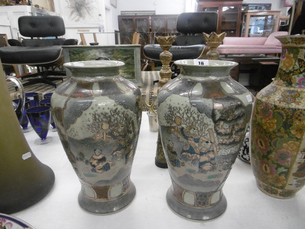 A pair of Satsuma style vases