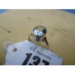 A 9ct gold and aquamarine dress ring