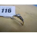 An 18ct gold & diamond solitaire ring size O
