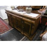 A marble top sideboard