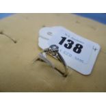 A 9CT white gold, diamond solitaire ring, 1/4ct,