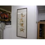 A FRAMED ORIENTAL PANEL,