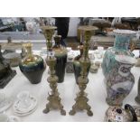 A pair of brass pricket candlesticks