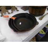 A set enameled iron frying pans