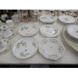 A set of six Limoges cabinet plates plus one other