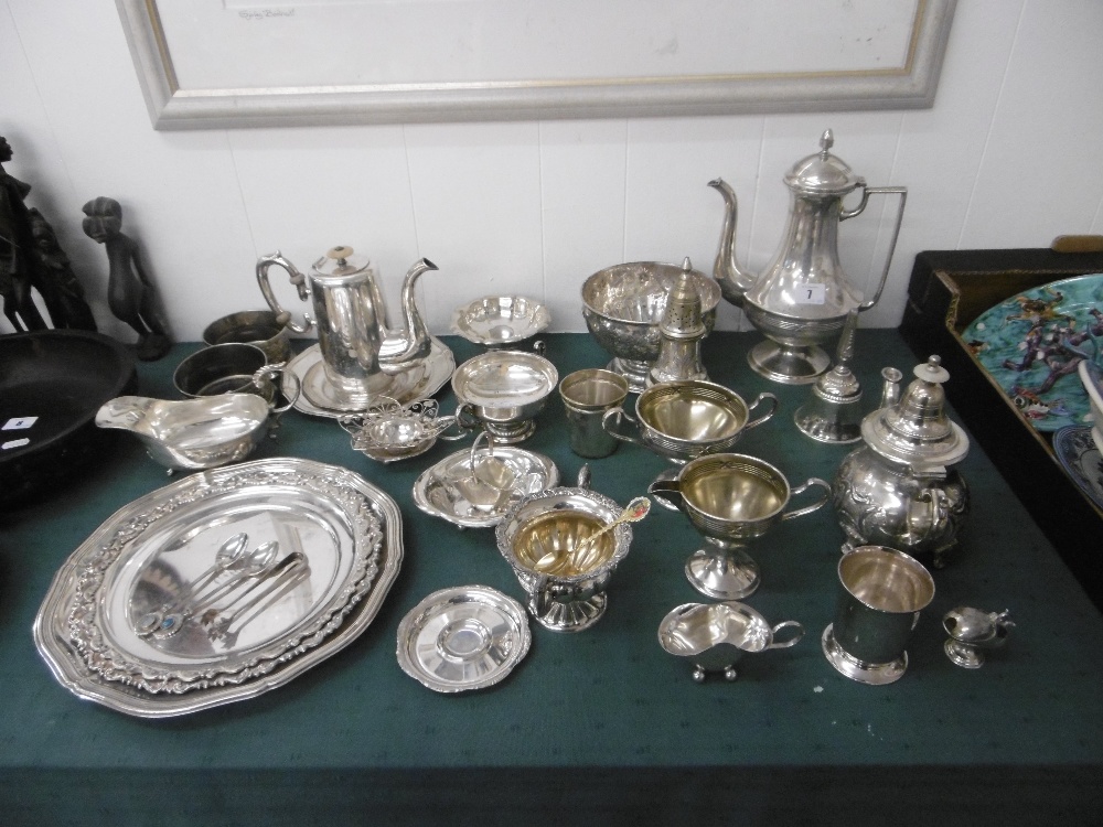 A large quantity of silver plate including a three piece coffee set