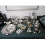 A large quantity of silver plate including a three piece coffee set