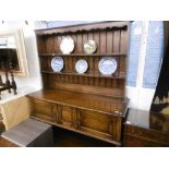 AN OAK DRESSER (CIRCA 1920) STAMPED MAPLES ON BACK, 152X190CM APPROX.