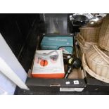 An assortment of vintage appliances in original boxes