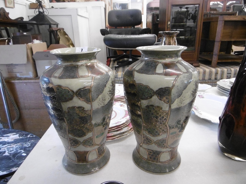 A pair of Satsuma style vases