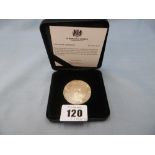 A cased royal mint Olympics coin
