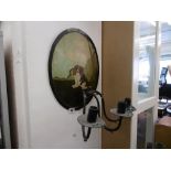 A wall sconce decorated with a Spaniel