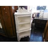 A painted wall mounted corner unit,