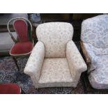 An upholstered drop end sofa and armchair