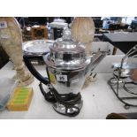 A vintage chrome electric coffee pot