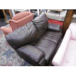 A leather two seater sofa