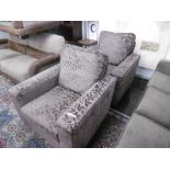 A pair of upholstered armchairs