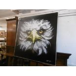 A framed oil on canvas of an eagle signed