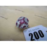 A continental art deco style ruby and diamond dress ring possible platinum,