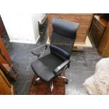 A black leatherette office chair