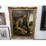 A gilt framed oil on canvas forest scene
