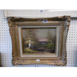 A gilt framed oil on canvas lake scene