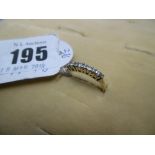 A 9ct gold half eternity ring,