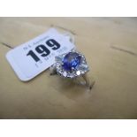 An 18ct white gold diamond and sapphire ring, sapphire 2.09ct, diamond total weight 0.