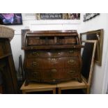 An 18th century Dutch walnut bombe secretaire bureau width 114cm height 113cm depth 57cm