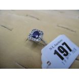 A white metal marked 18ct art deco style sapphire and diamond ring,