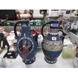 A pair of continental vases