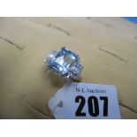 An 18ct white gold aquamarine and diamond ring, aquamarine 7ct,