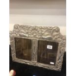 A double continental white metal photo frame marked sterling