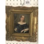 A gilt framed miniature oil on board of a lady,