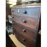 A 19th century bow fronted chest of drawers
