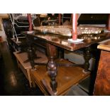 A set of four Edwardian mahogany framed chairs and a draw leaf table