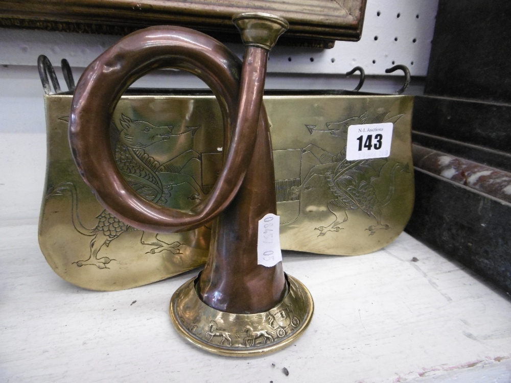 A small Victorian copper coaching horn and another coaching related item with coat of arms