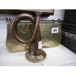 A small Victorian copper coaching horn and another coaching related item with coat of arms